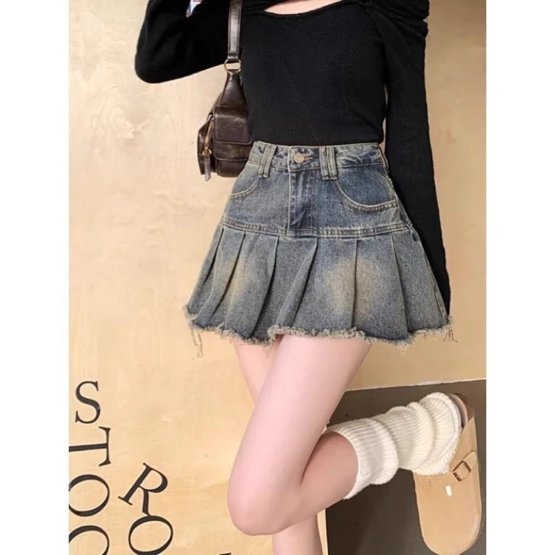 Chân váy bò xếp li to dáng xoè có quần trong lưng cao phong cách Hàn Quốc
