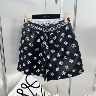 Quần short gió nam Dolce in hoạ tiết vân DG monogram cạp chun dệt chữ túi sau hot 2024