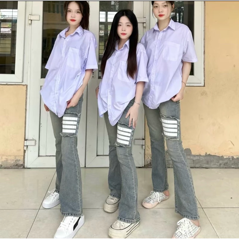 Quần jeans ống loe in vạch mài đùi lưng cao chất bò co dãn phong cách trẻ trung năng động phong cách Hàn Quốc