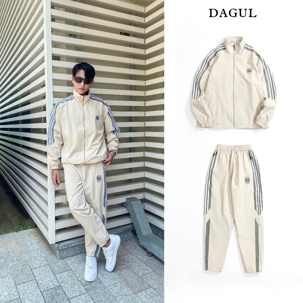 (M-23)Bộ gió DAGUL nam nữ phối viền, lót lưới, logo thêu, túi quần và túi áo có dây kéo khóa, cản gió và đi được mưa nhỏ