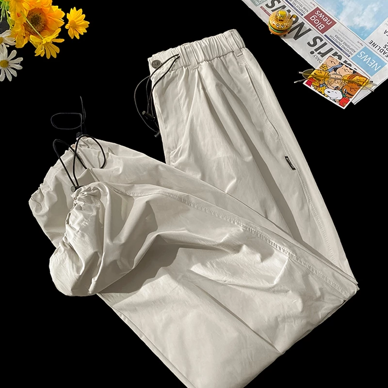 Quần dài kaki ống rộng suông cạp cao thời trang unisex, quần thể thao nam nữ phong cách streetwear chất vải nhẹ thoáng