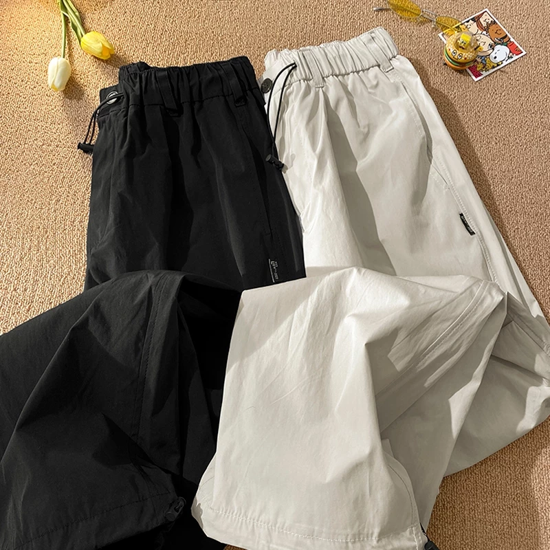 Quần thể thao nam nữ phong cách streetwear chất vải nhẹ thoáng, Quần dài kaki ống rộng suông cạp cao thời trang unisex