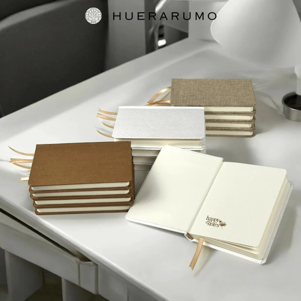 Sổ bìa cứng A6 HUERARUMO, 200 trang, giấy bookpaper màu vàng 66-70 gsm, bìa cứng vải dệt thoi và vải giấy giặt được.