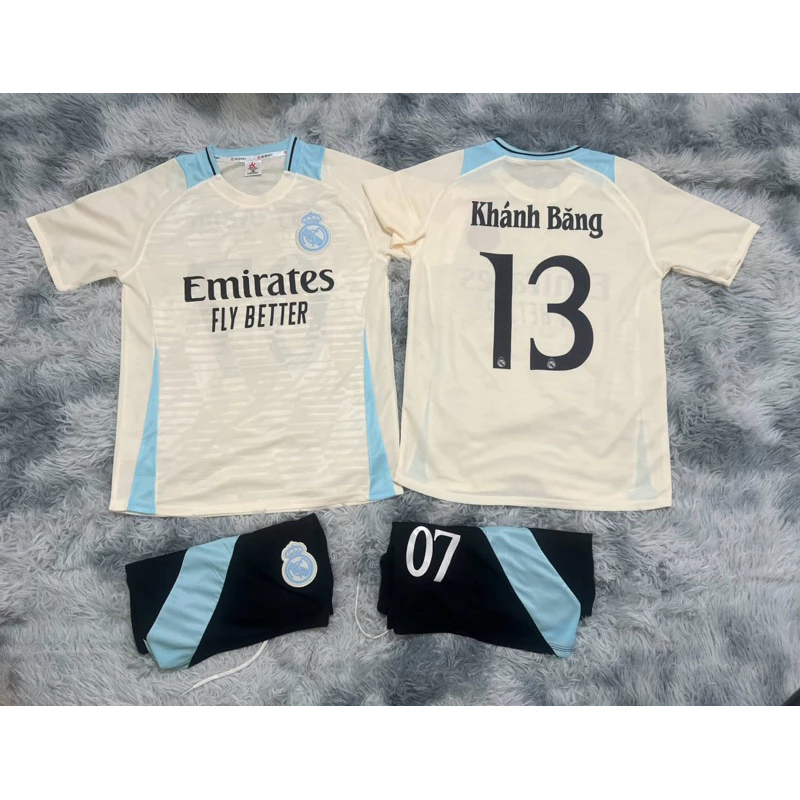 Bộ Quần Áo Đá Banh Real Kem Viền Xanh (Có In Tên Số) Thun Mè kim Cao Cấp Logo Thê