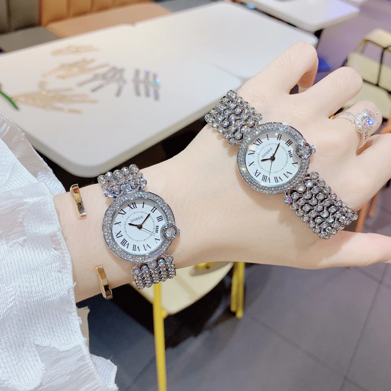 Đồng Hồ Nữ Gossie Dáng Trăng Khuyết Dây Bi Nạm Full Đá Trấu