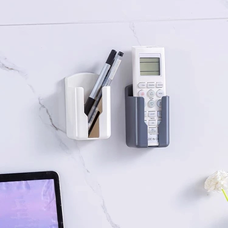 Giá đỡ điện thoại, kệ đựng điều khiển treo tường không cần khoan đục DN462