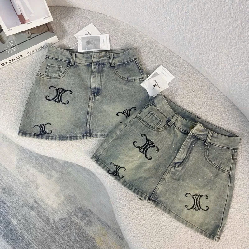 Chân váy jean đính đá, chân váy jean ngắn, chân váy jeans đính đá thêu chữ X chất liệu chân váy bò cao cấp