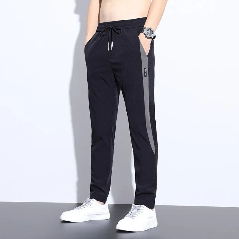 Quần dài nam quần thể thao nam vải poly cao cấp co dãn thoải mái size đến 85kg