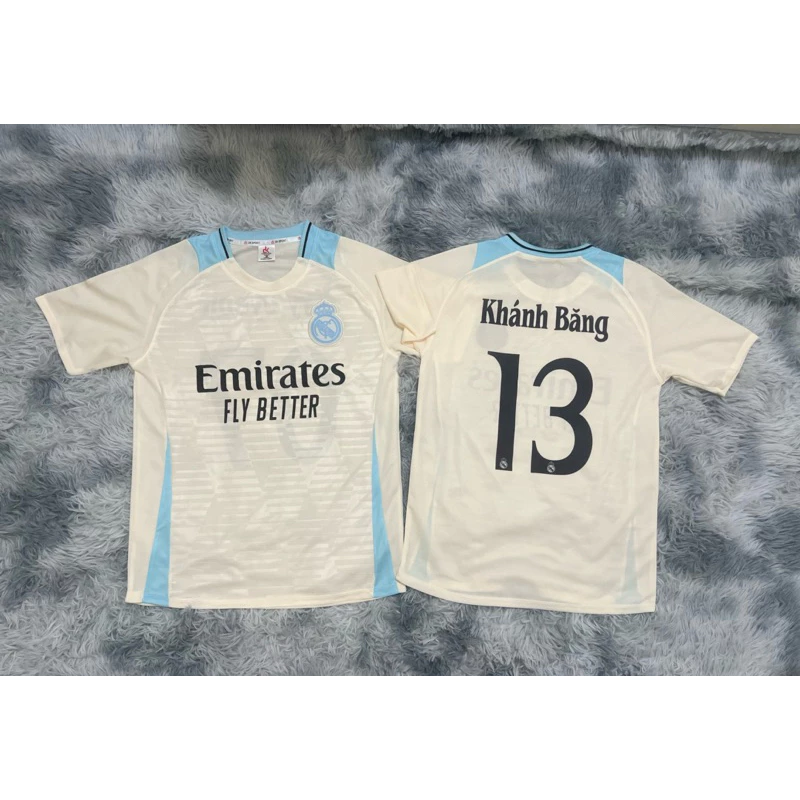 Bộ Quần Áo Đá Banh Real Trắng Kem (Nhận In Tên Số) Vải Mè Kim Cao Cấp Logo Thêu Unisex Top Sport
