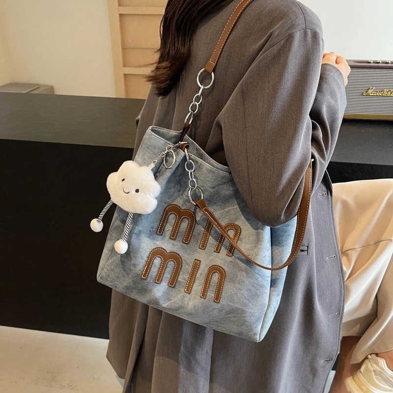 Túi đeo vai nữ thông thường dung tích lớn túi tote thời trang thư denim mới để vừa đi học đi làm phong cách retro