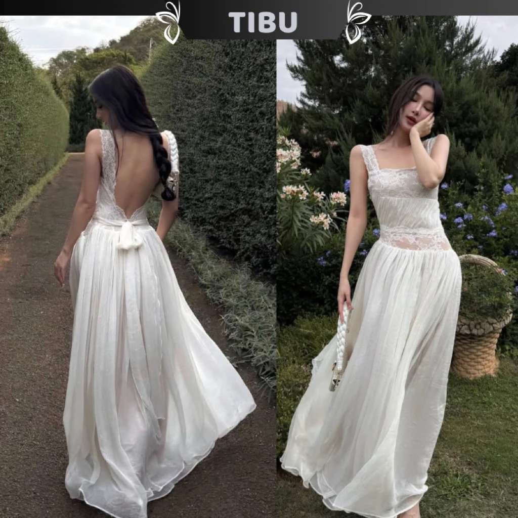 TIBU - Đầm Maxi Hai Dây Hở Lưng Cột Nơ Dáng Xoè Tiểu Thư Sang Chảnh Phối Ren Đi Chơi Dạo Phố D711