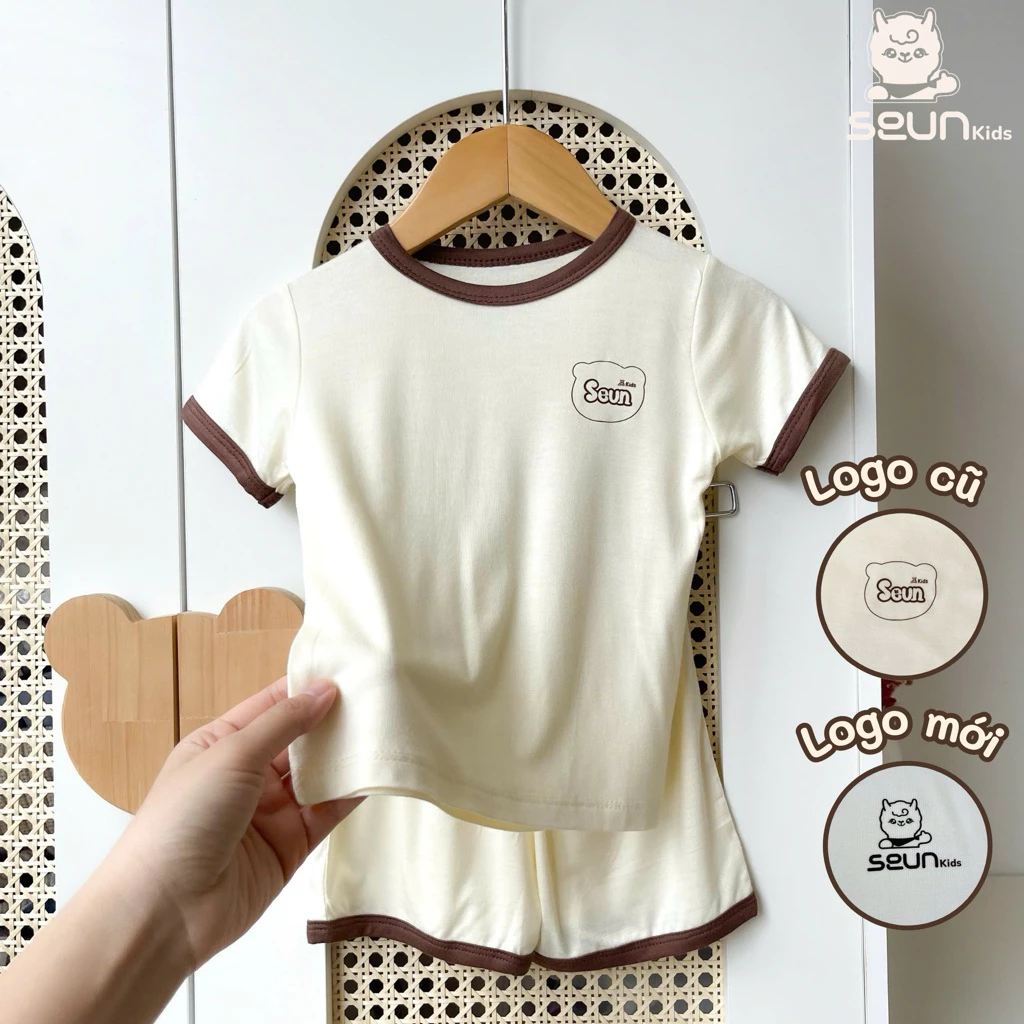 "| SEUNKIDS | Bộ cộc tay cho bé trai bé gái (15 màu-2 link) visco lụa mát lạnh 8kg đến 35kg bộ mặc nhà set mặc nhà" đang được đối chiếu cho người mua tại Việt Nam