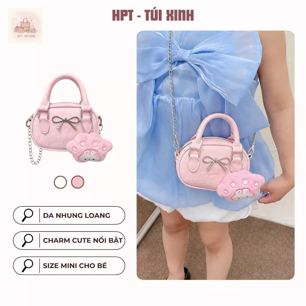Túi xách mini cho bé gái đính nơ kim loại tặng kèm charm thú bông dễ thương
