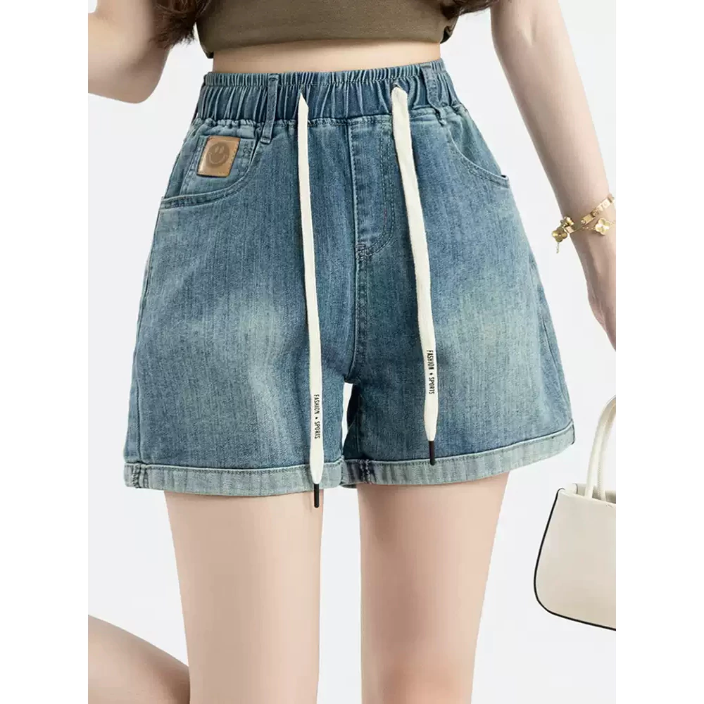 Quần short denim ống rộng co giãn dành cho nữ, mùa hè 2026, eo chun, dáng rộng, size nhỏ, họa tiết mặt cười [M85]