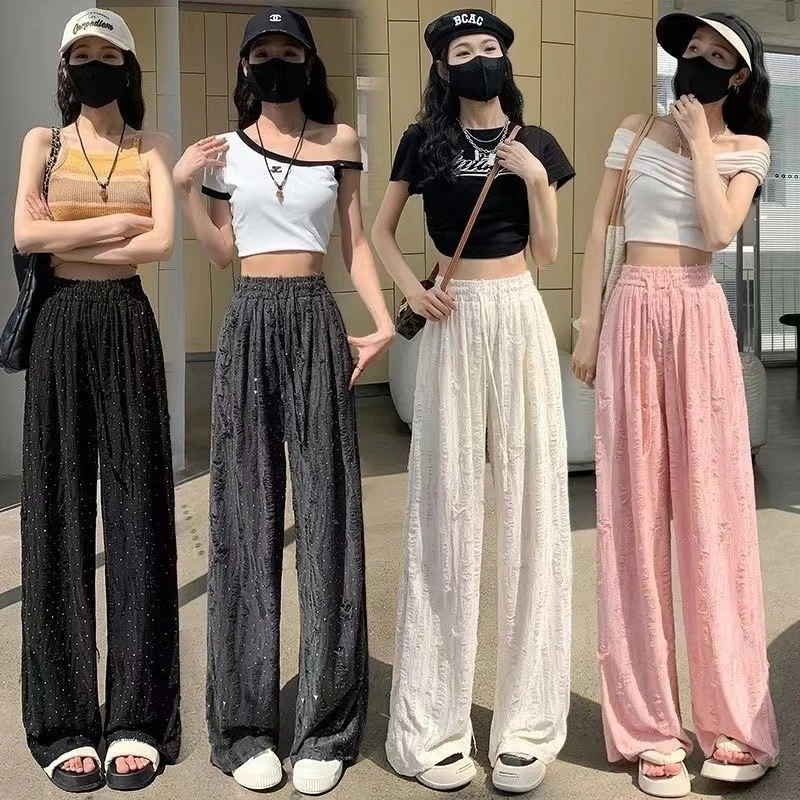 Quần ống rộng đính đá Họa tiết nổi phong cách trent hot WQ95
