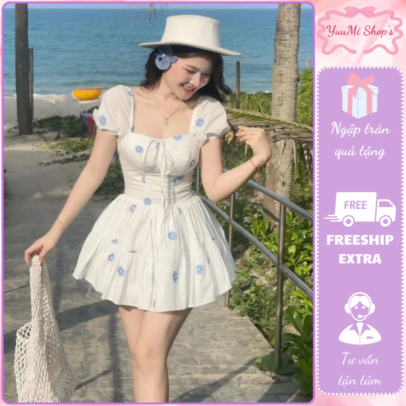 Đầm xòe dáng ngắn trắng thêu hoa xanh thắt nơ ngực ôm eo corset đi du lịch nghỉ dưỡng hè HCOM26105