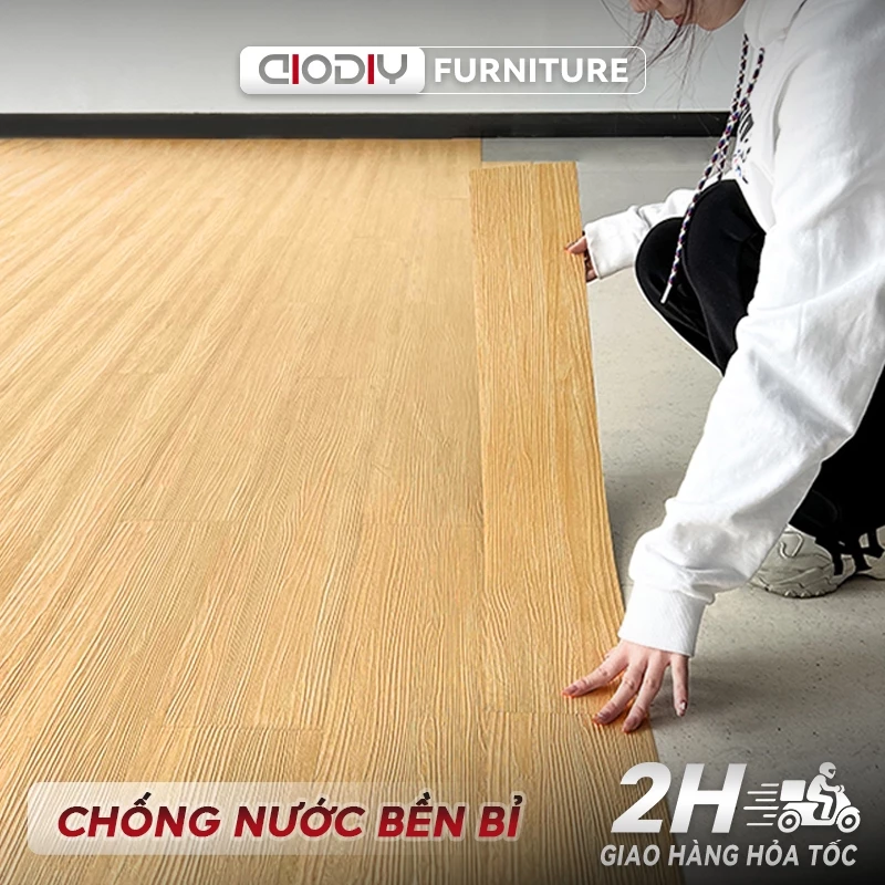Giấy dán sàn AIODIY Miếng nhựa lót sàn giả vân gỗ sang trọng, có keo sẵn dễ dán