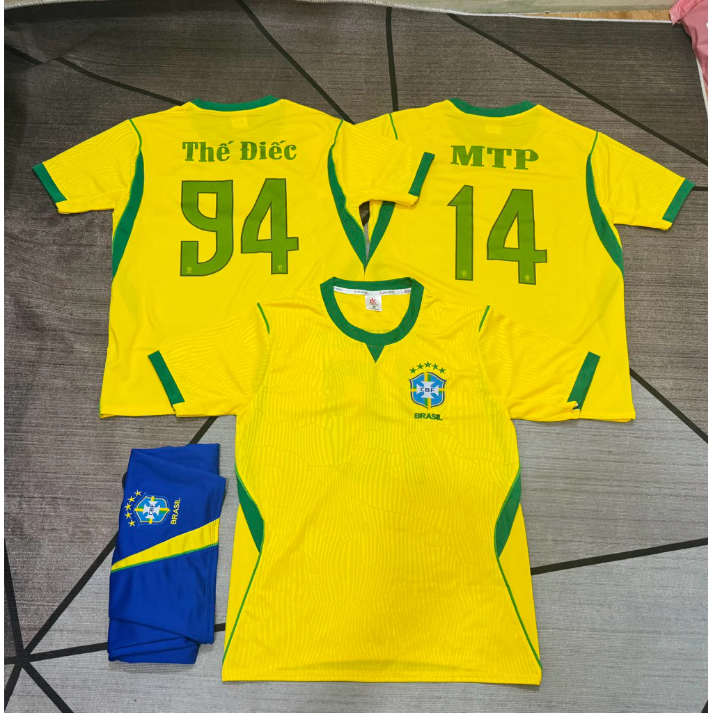 Quần Áo Đá Banh Trẻ Em Và Người Lớn Brasil Vàng 2026 (Có In Tên Số) Thun Mè Cao Cấp Logo Thêu Nam Nũ