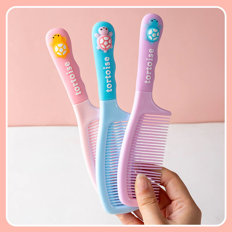 Lược chải tóc hình rùa con dễ thương cute tay cần nhựa dẻo kích thước nhỏ gọn mang đi tiện lợi cho bé