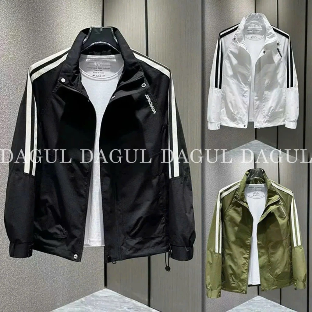 (M-24) DAGUL Áo gió DAGUL 2 lớp cổ cao logo thêu chỉ ánh kim phối 2 đường viền cánh tay khóa kéo có cúc bấm