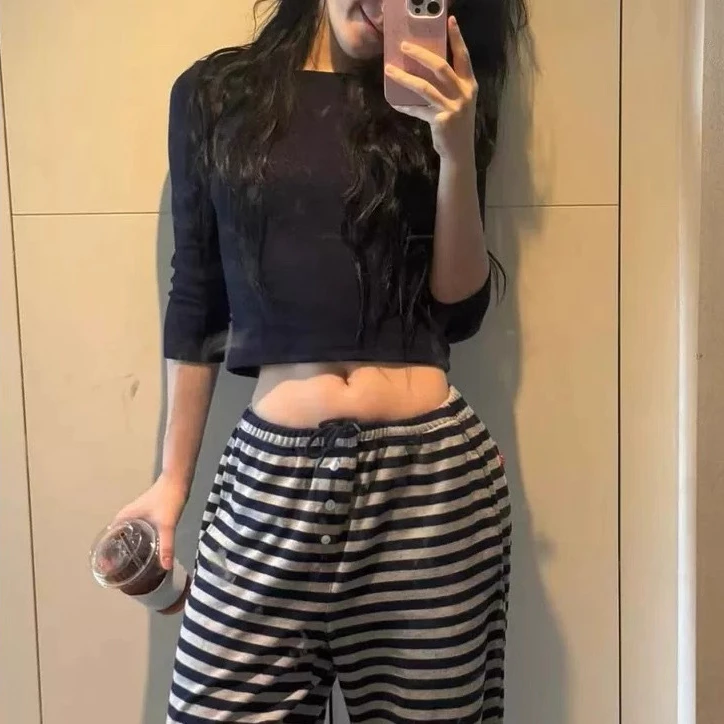 Hàn Quốc đại lý mua sắm quần dài sọc thong thả thả lỏng nửa nút quần dây rút Lý Thái cổ cùng loại