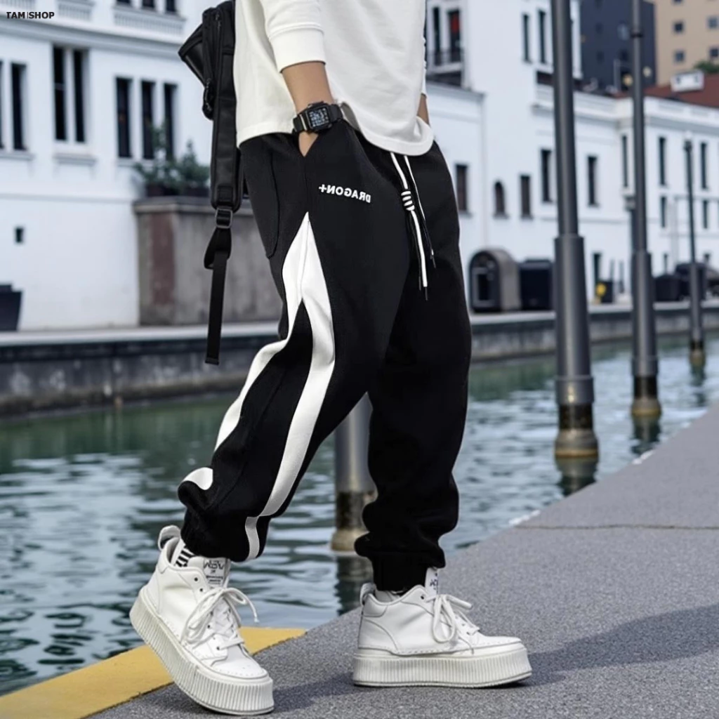 Quần jogger thể thao nỉ nam Hàn Quốc quần phối viền chữ Dragon quần thun bo gấu quần 2025 K1