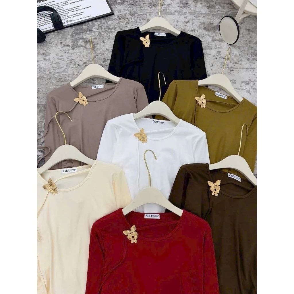 Áo cotton ríp lụa dài tay, kiểu đẹp, kèm charm gắn dễ thương.